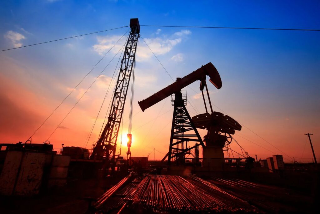 Oil field at dusk